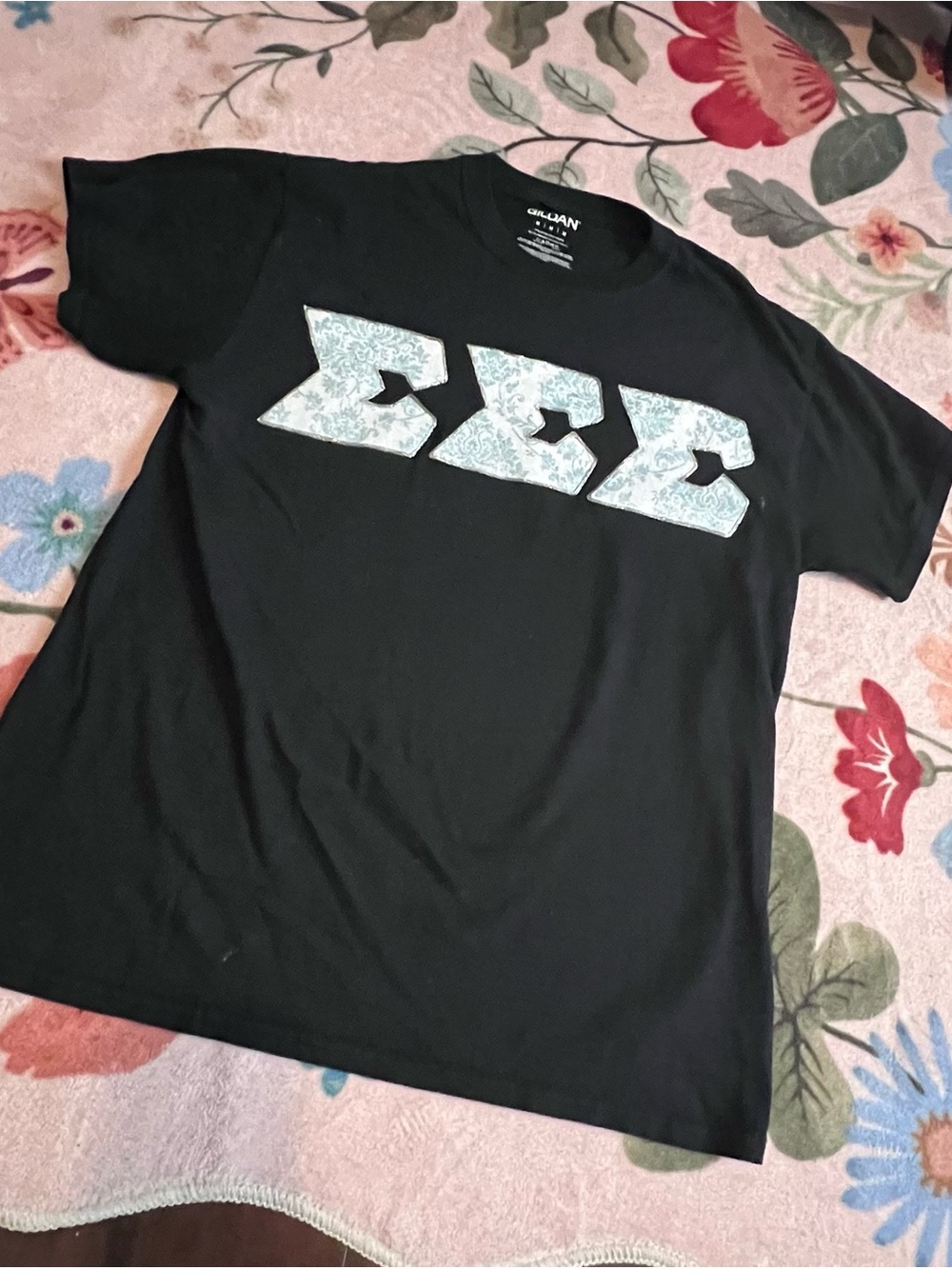 Gildan Black Short-Sleeve Tee with Light Blue Floral Greek letters